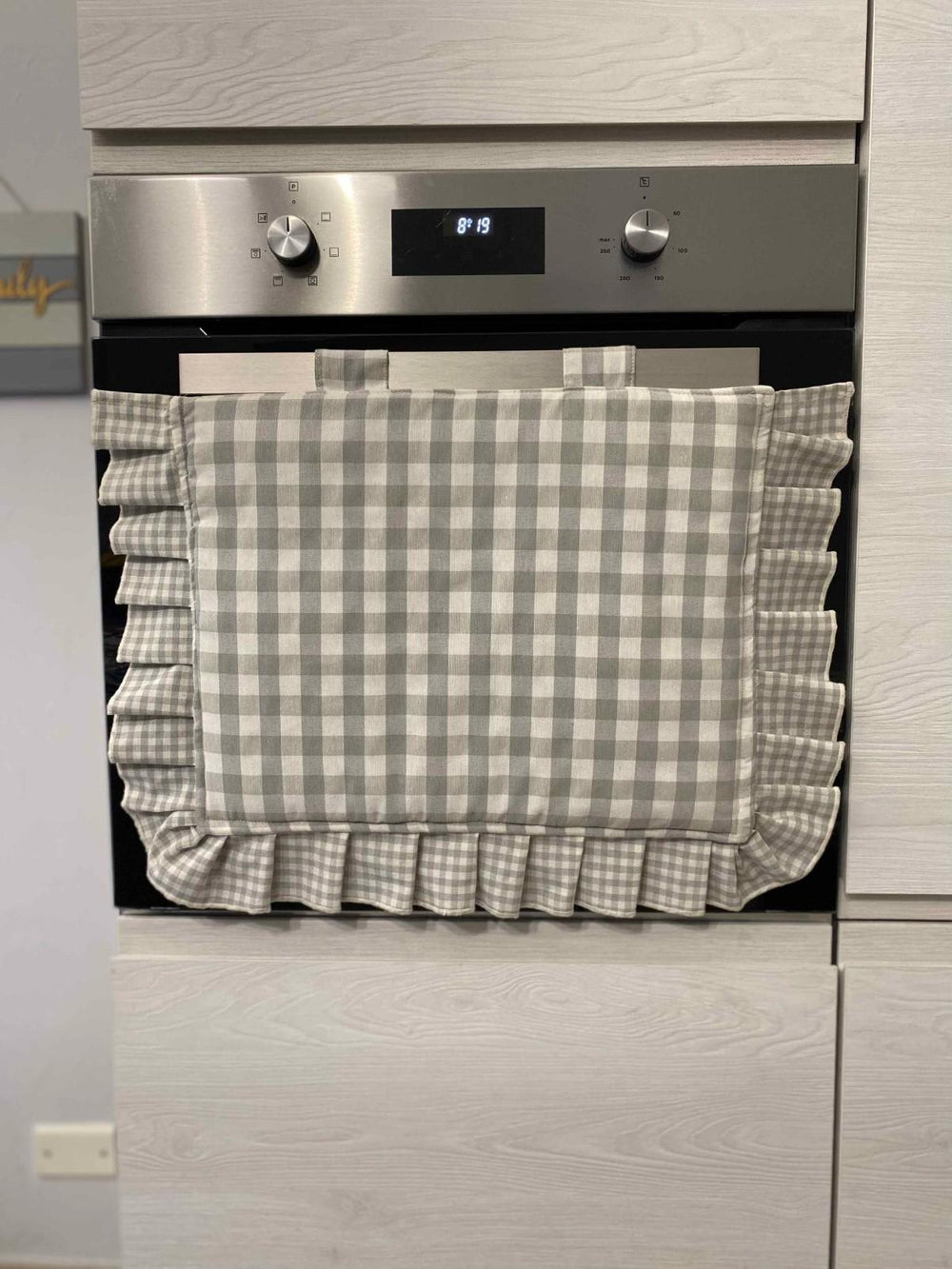 Copriforno fantasia quadrettato grigio